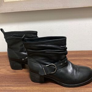 Tara M Dusty Women’s Fashion Boots in Black with Block Heel & Decorative Strap.